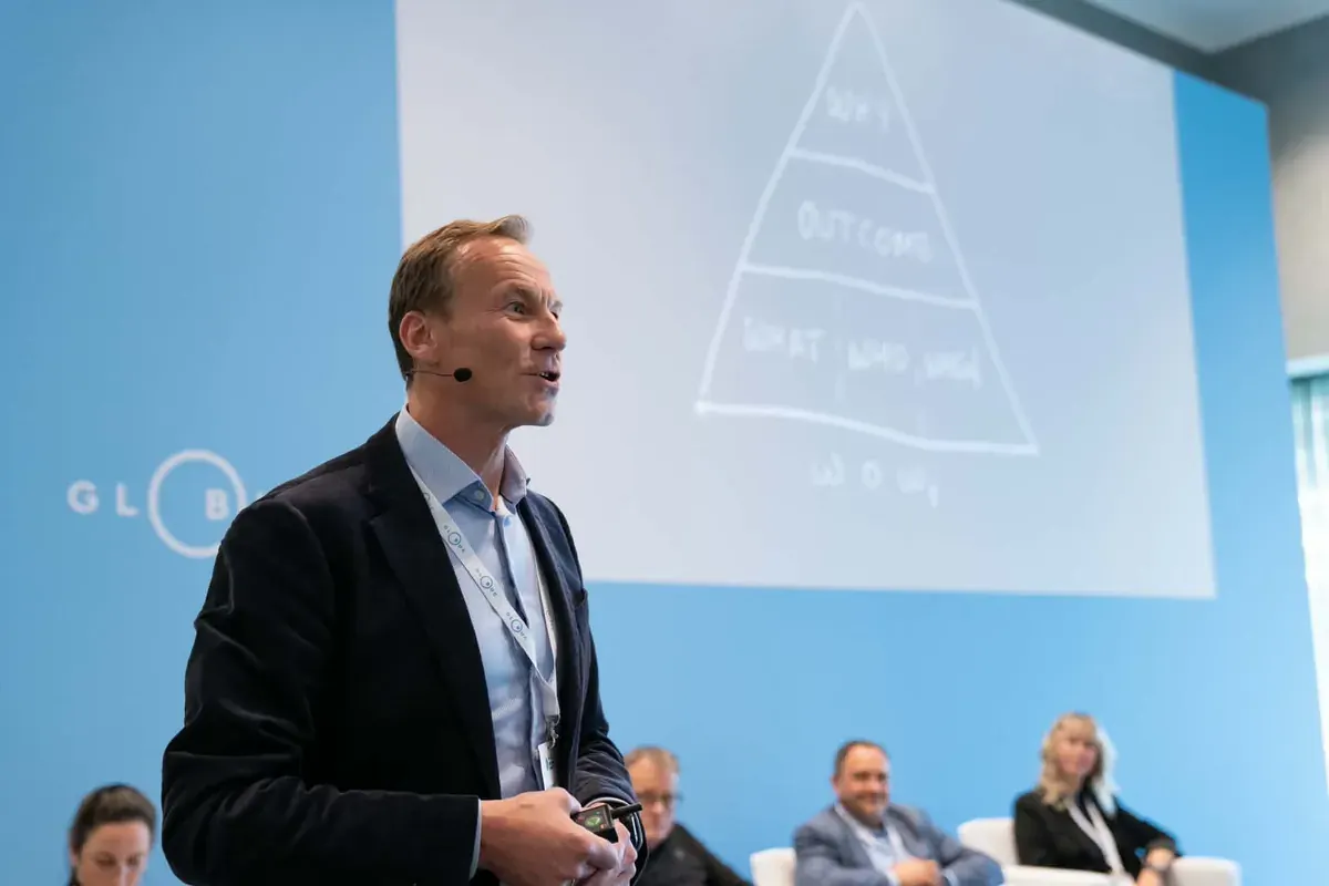 Egil Winje Nybakk on stage presenting the WOW3 framework